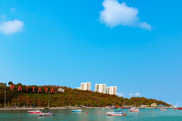 Tropical landscape at Pattaya City is near Koh Lan island in the Thai sea with boats and beautiful tropical beaches.