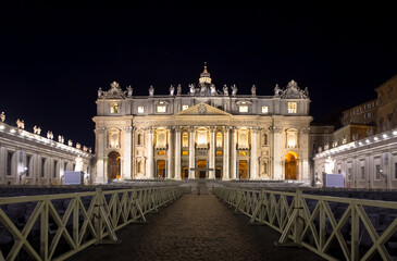 Obraz premium Saint Peter Basilica in Vatican City illuminated by night, masterpiece of Michelangelo and Bernini