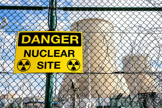 Danger warning sign on the security fence of a nuclear power station