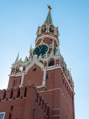 Fototapeta na wymiar Spasskaya tower of red brick with a clock. Red Square, Moscow, Russia. Vertical.