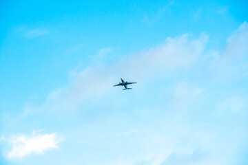 a passenger plane is flying in the sky