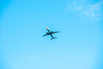 Fototapeta na wymiar a passenger plane is flying in the sky