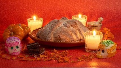 Obraz na płótnie Canvas bread of the dead with candles for the altar of the day of the dead in mexico