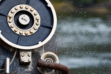 Pulley operating on a fisherman's boat in Alaska. Marine reel of rope. International Fisherman's Day; International Year of Artisanal Fisheries and Aquaculture; World Fisheries Day