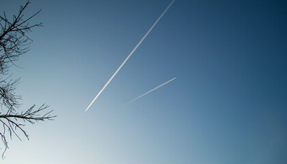airplanes in the sky flying in different directions