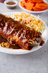 A view of a wet burrito.