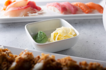 A view of a sauce of ginger and wasabi.