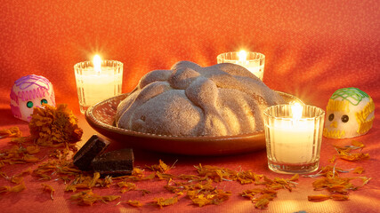 bread of the dead with candles for the altar of the day of the dead in mexico
