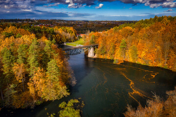 Autumnal scenery and the railway bridge in Rutki, Kashubia. Poland