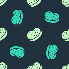 Green and beige Bath sponge icon isolated seamless pattern on blue background. Sauna sponge. Vector