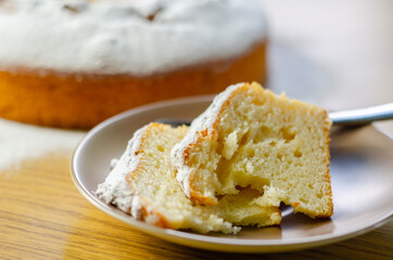 Portion of Madeira ring loaf cake served on a small plate
