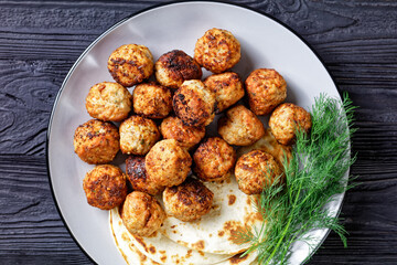 Keftedakia, fried greek meatballs on a plate
