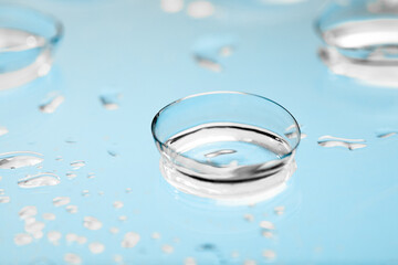 contact lenses with droplets around close up view  - Image