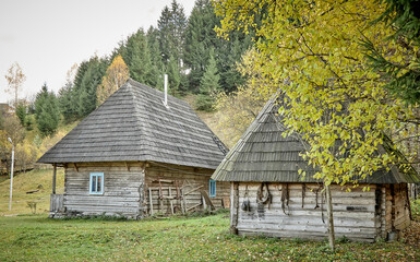 Fototapeta na wymiar Village in the mountains. Autumn in a mountain village