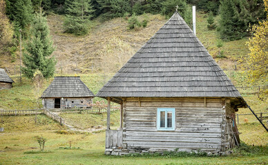 Fototapeta premium Village in the mountains. Autumn in a mountain village