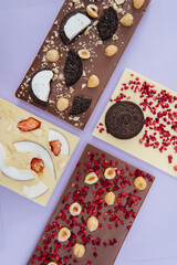 Natural handmade chocolate close-up on a bright background.