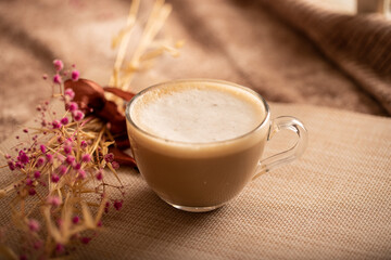 morning coffee, still life with a cup of coffee in beige tones