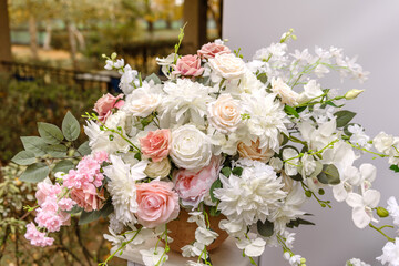 Beautiful floral compositions in the restaurant for the wedding ceremony