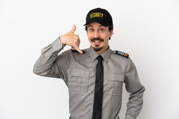 Young caucasian security man isolated on white background making phone gesture. Call me back sign