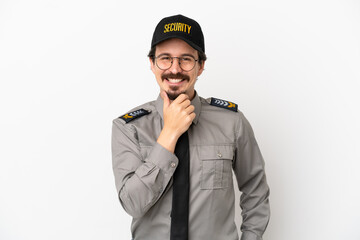 Young caucasian security man isolated on white background with glasses and smiling