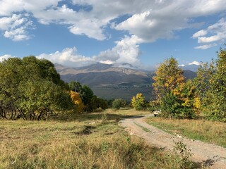Fototapeta na wymiar autumn landscape with mountains and clouds, Margahovit, Armenia
