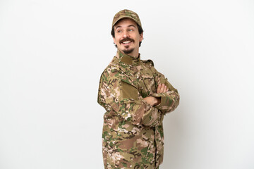 Soldier man isolated on white background with arms crossed and happy