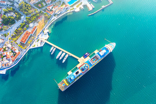 Big cruise liner ship near the pier. Argostoli, Kefalonia island, Greece. Travel concept.