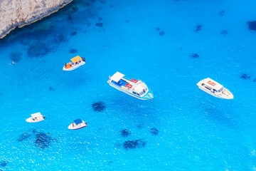 Aerial drone view of beautiful ionian sea with boats. Vacation background. Zakynthos island, Greece