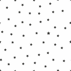 Seamless pattern with black stars on white background. Vector illustration.