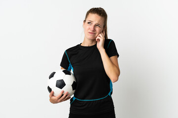 Young football player woman isolated on white background frustrated and covering ears