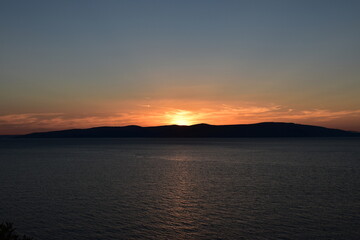 Obraz premium Landscape of a sunset at sea