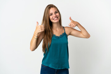 Fototapeta na wymiar Young caucasian woman over isolated background giving a thumbs up gesture
