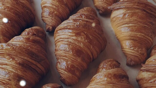 French croissants. Showcase with fresh golden classic croissants top view. High quality 4k footage