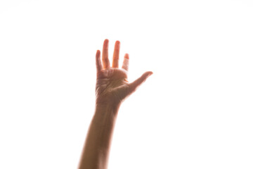 Hand gestures. woman's hand reaches up to catch or grab something,