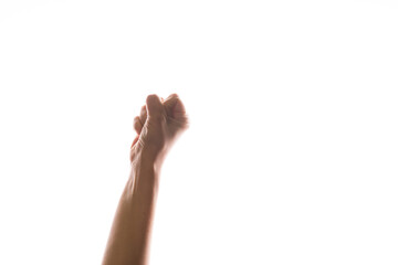 Hand gestures. woman's fist stretches up, a symbol of the struggle for rights and dissent,