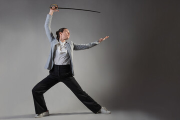 A businesswoman in a business casual suit attacks competitors,
