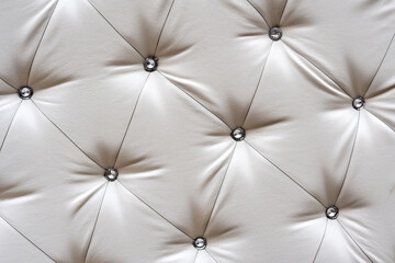 Bright upholstered sofa. Leather Sofa Texture , Leathers Upholstery Pattern. Light background furniture upholstery