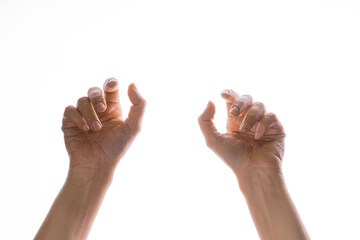 Hand gestures. Elegant women's hands catch something that falls from above,