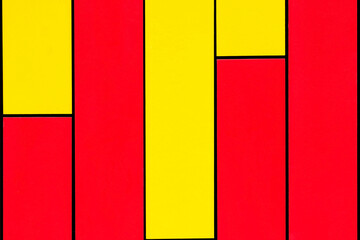 texture Stripes of red and yellow. Background of yellow and red vertical stripes paint streams on  surface, streams of  red paint