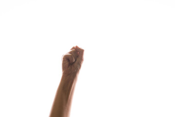 Hand gestures. woman's fist stretches up, a symbol of the struggle for rights and dissent,