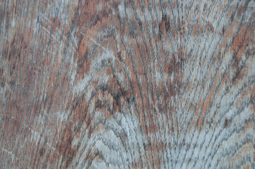 cracked paint on the door. old corrugated surface.brown background	