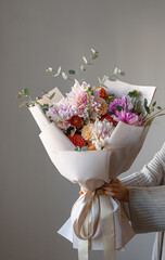 Close-up of a large festive bouquet with chrysanthemum flowers.