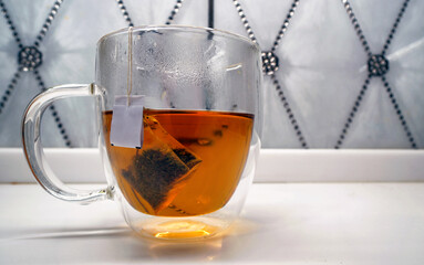 Transparent cup of tea
