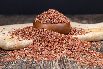raw uncooked red rice, unpeeled