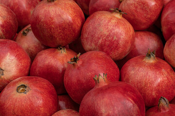 Pomegranate, Punica granatum.  Full frame of ripe delicious fruits Pomegranate top view