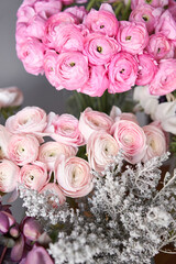 Set of white, pink and magenta flowers for Interior decorations. The work of the florist at a flower shop. Fresh cut flower.