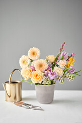 Finished flower arrangement in a vase for home. Flowers bunch, set for interior. Fresh cut flowers for decoration home. European floral shop. Delivery fresh cut flower.