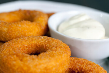 cheese rings deep-fried with creamy garlic sauce