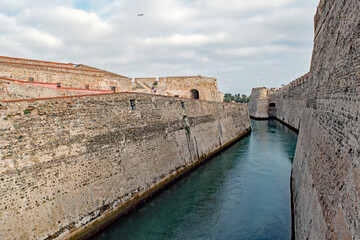 A moat within Plaza de Armas of the Royal Walls, a fortress, Ceuta, Spain.