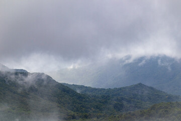 End of summer in the mountains. Bieszczady trails in the fog.